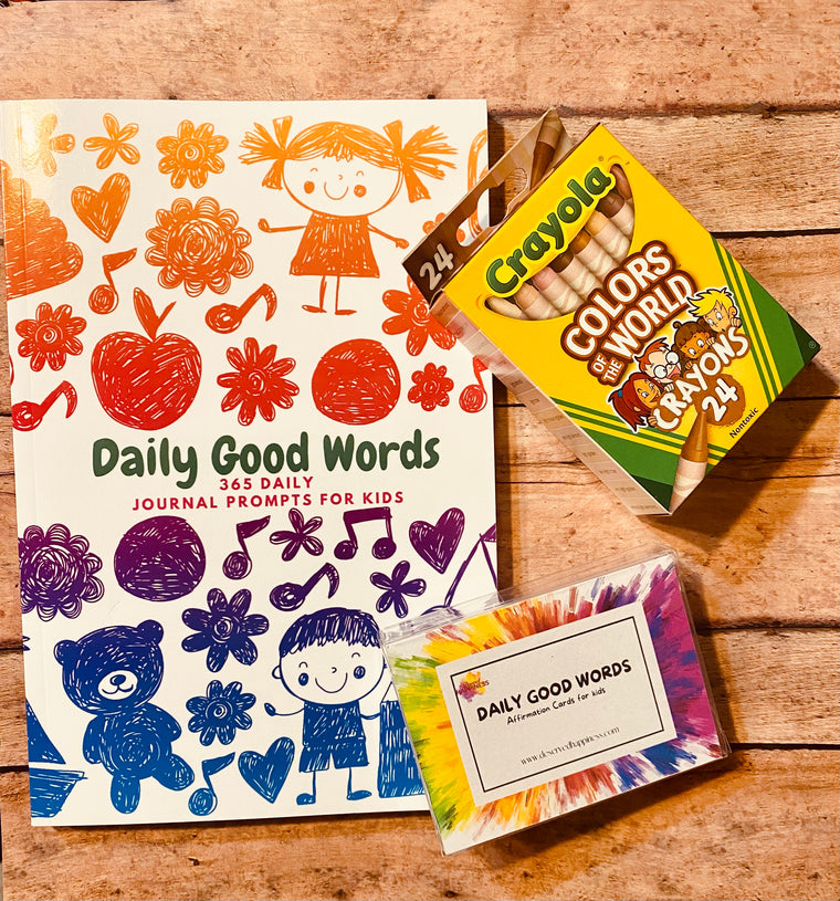 Multi-color kids journal with a deck of children affirmation cards and a pack of crayons